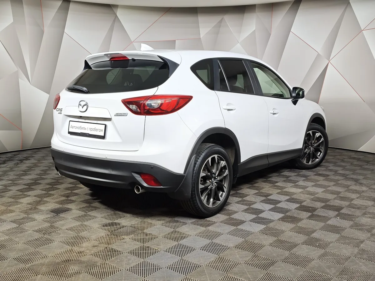 Mazda CX-5 2.0 AT 4WD (150 л.с.) Drive Белый в АВИЛОН. Слайд №2