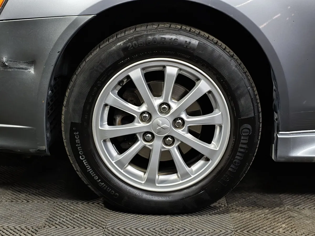 Mitsubishi Lancer 1.6 AT (117 л.с.) Серый в АВИЛОН. Слайд №9