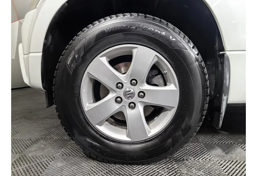 Suzuki Grand Vitara 2.4 AT (169 л.с.) Белый в АВИЛОН. Слайд №9