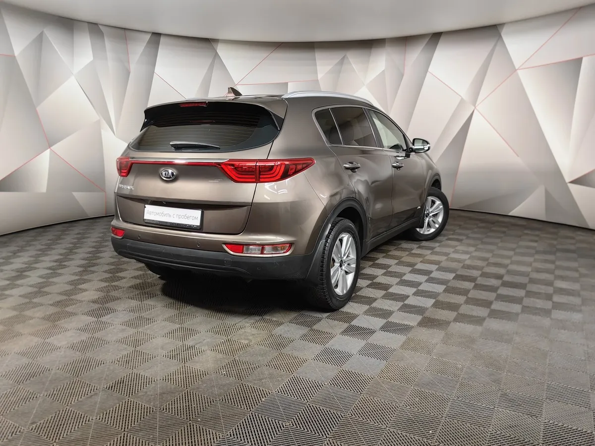 Kia Sportage 2.0 AT AWD (150 л.с.) Flagship Edition Коричневый в АВИЛОН. Слайд №2