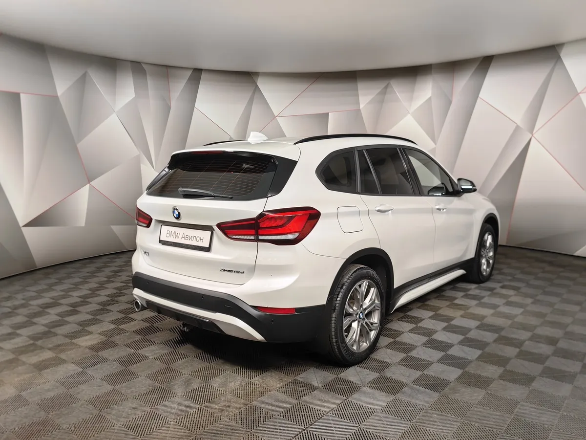 BMW X1 18d xDrive (150 л.с.) Sport Line Белый в АВИЛОН. Слайд №2