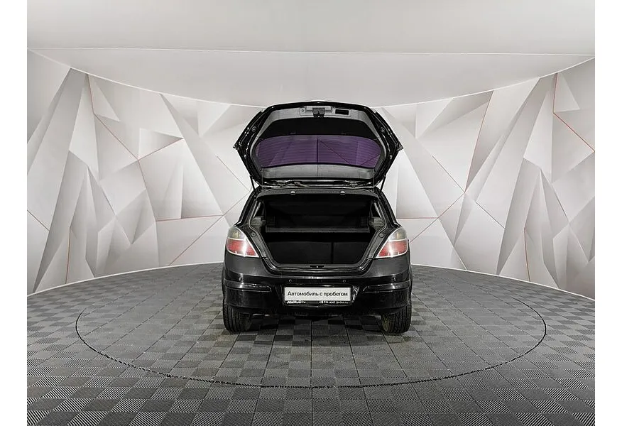 Opel Astra 1.8 AT (140 л.с.) Черный в АВИЛОН. Слайд №12