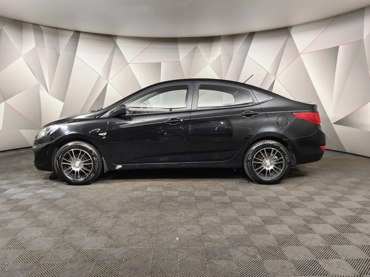 Hyundai Solaris 1.6 MT (123 л.с.) Optima Черный в АВИЛОН. Слайд №5
