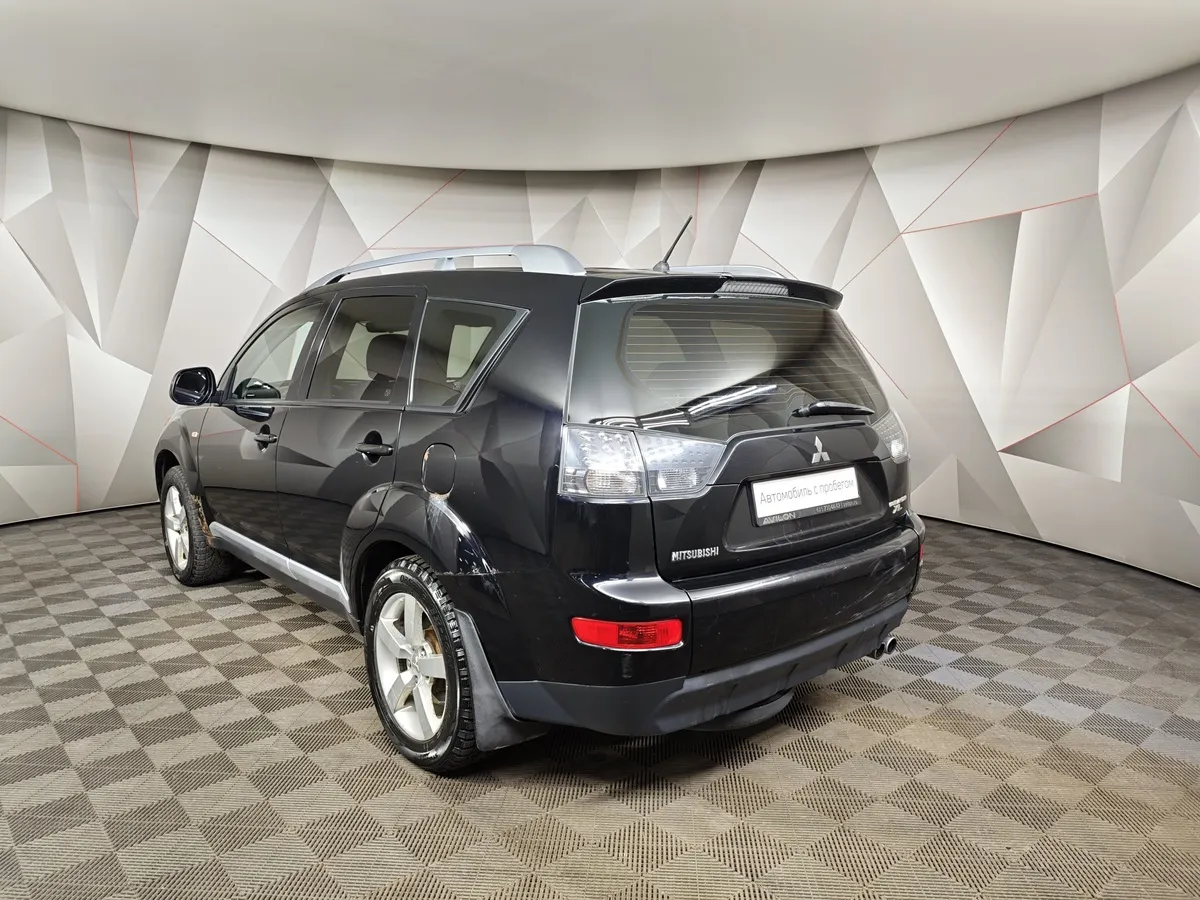 Mitsubishi Outlander 3.0 AT 4WD (223 л.с.) Черный в АВИЛОН. Слайд №4