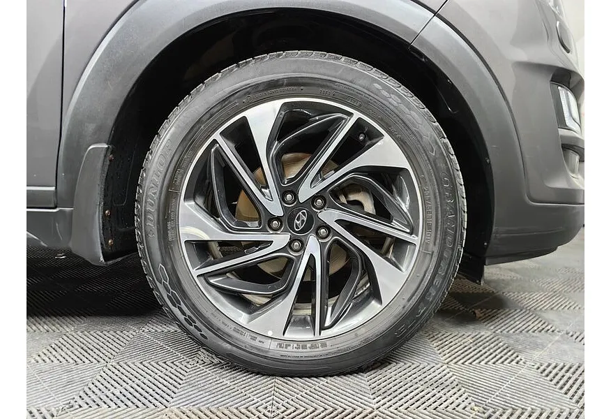 Hyundai Tucson 2.0 CRDi AT 4WD (185 л.с.) High-Tech Коричневый в АВИЛОН. Слайд №9