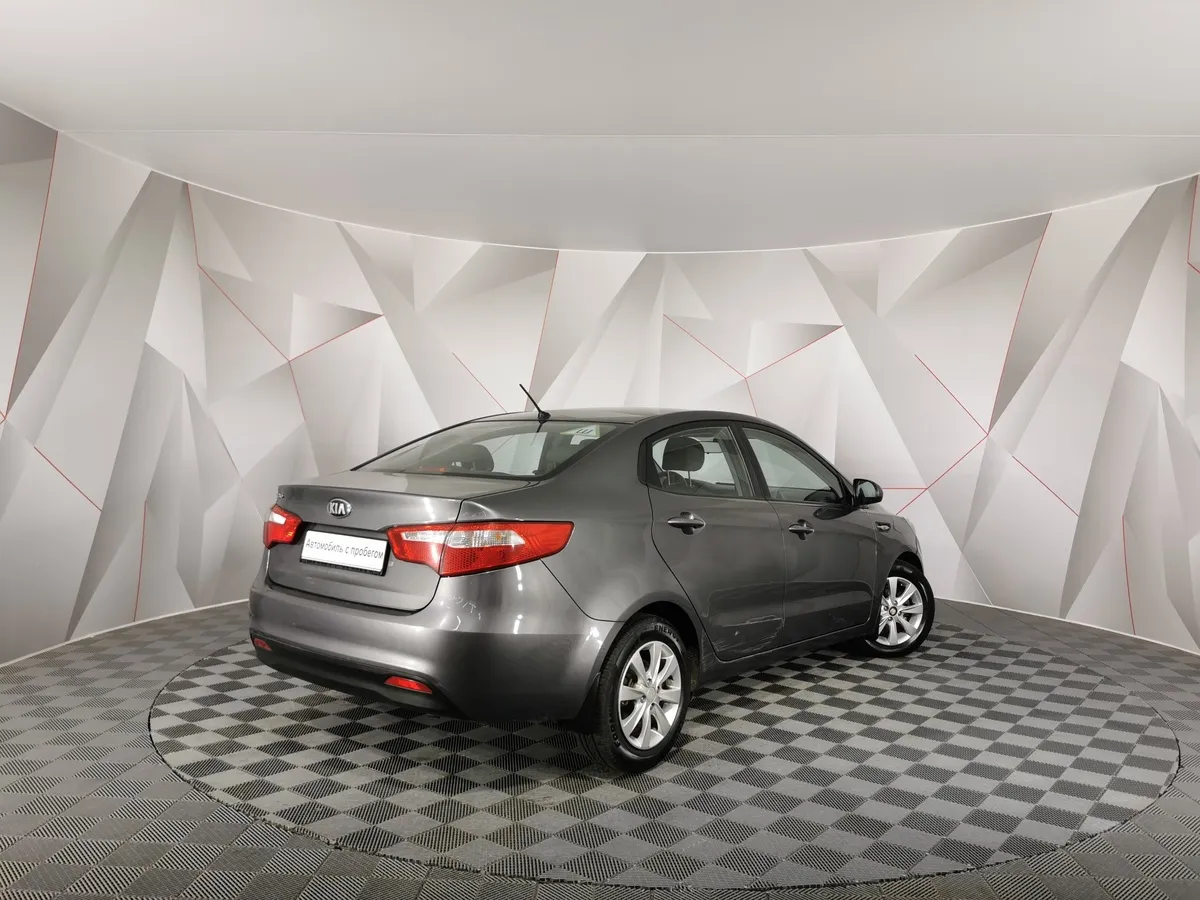 Kia Rio 1.4 AT (107 л.с.) Серый в АВИЛОН. Слайд №2