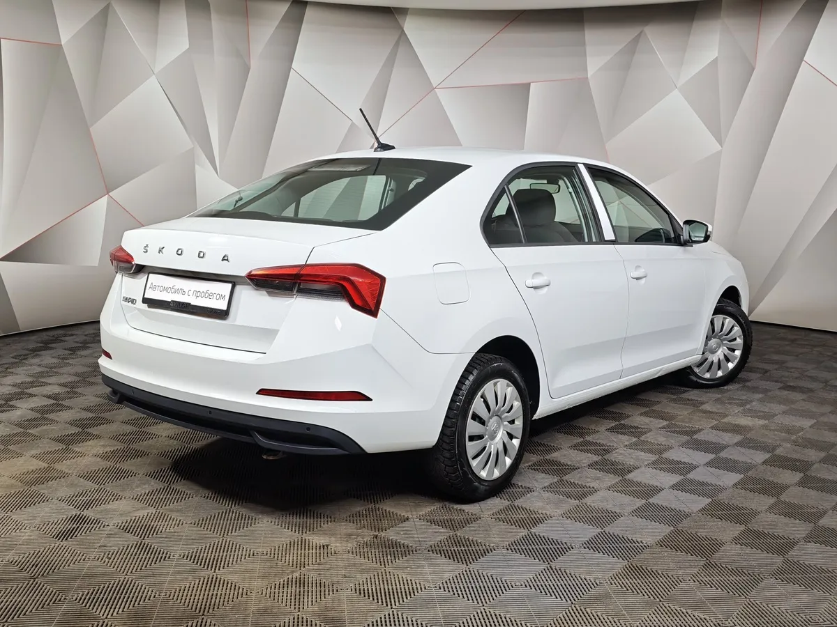 Skoda Rapid 1.6 AT (110 л.с.) Белый в АВИЛОН. Слайд №2