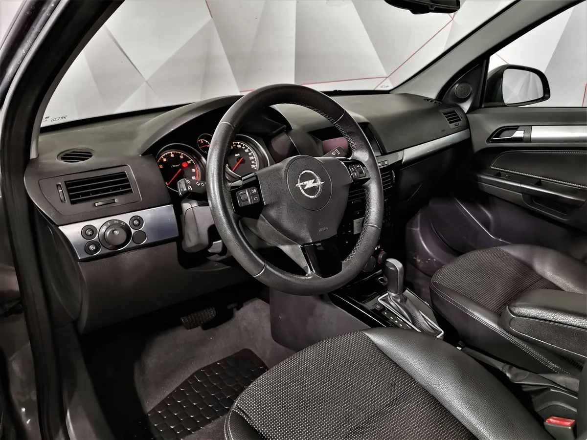Opel Astra 1.8 AT (140 л.с.) base Серый в АВИЛОН. Слайд №17