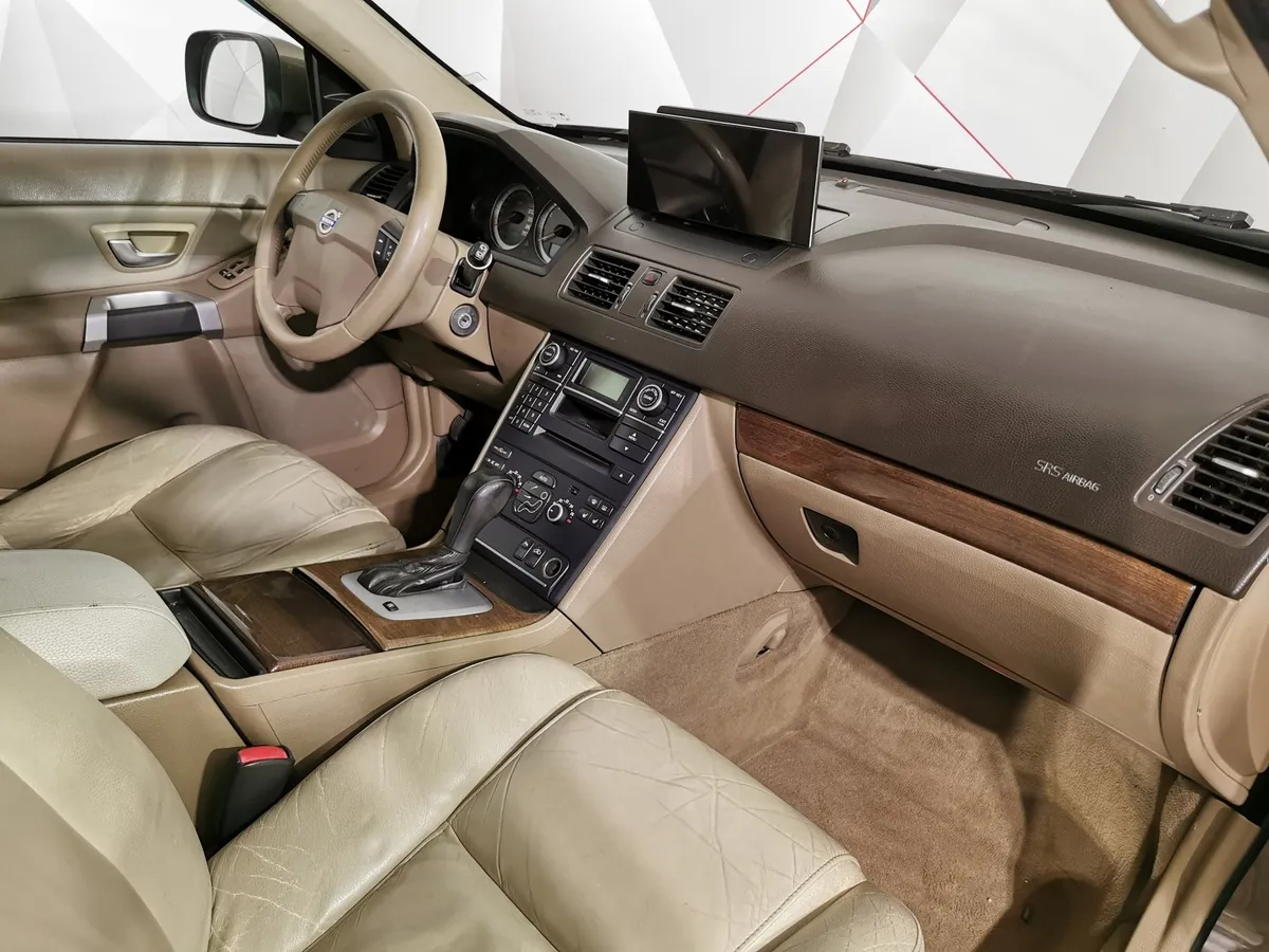 Volvo XC90 2.5 T5 Geartronic AWD (5 мест) (210 л.с.) Коричневый в АВИЛОН. Слайд №12
