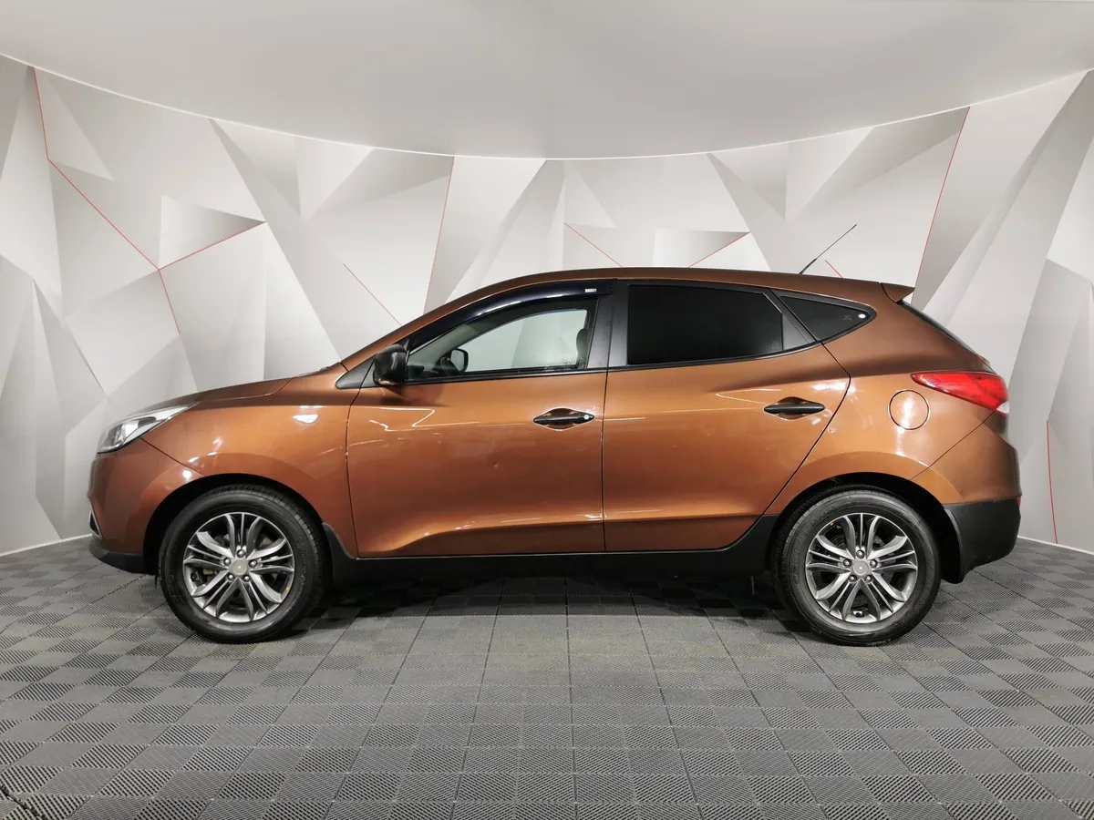 Hyundai ix35 2.0 AT (150 л.с.) Коричневый в АВИЛОН. Слайд №5