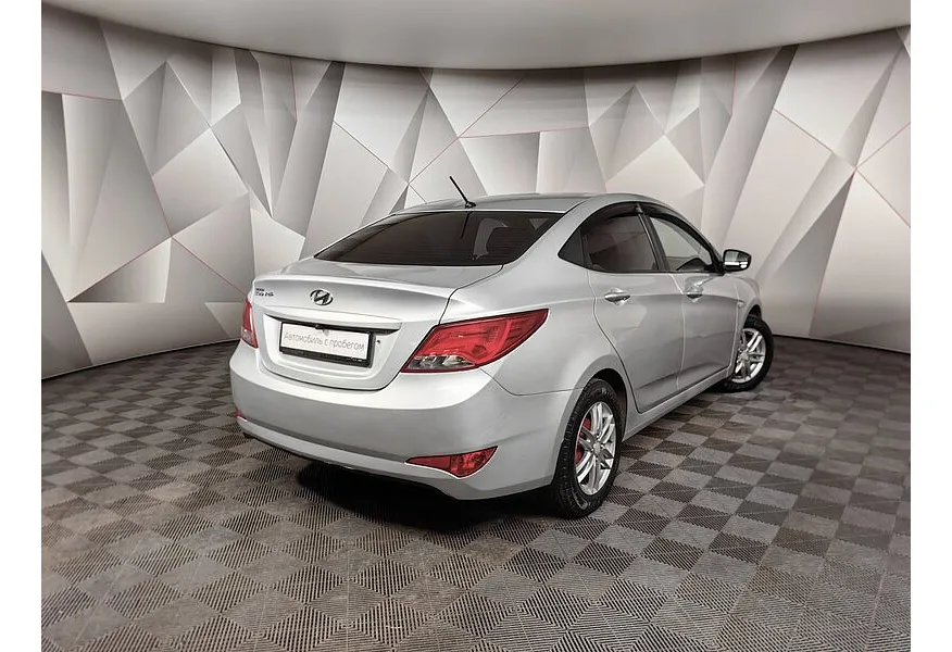 Hyundai Solaris 1.4 MT (107 л.с.) Active Серебристый в АВИЛОН. Слайд №2