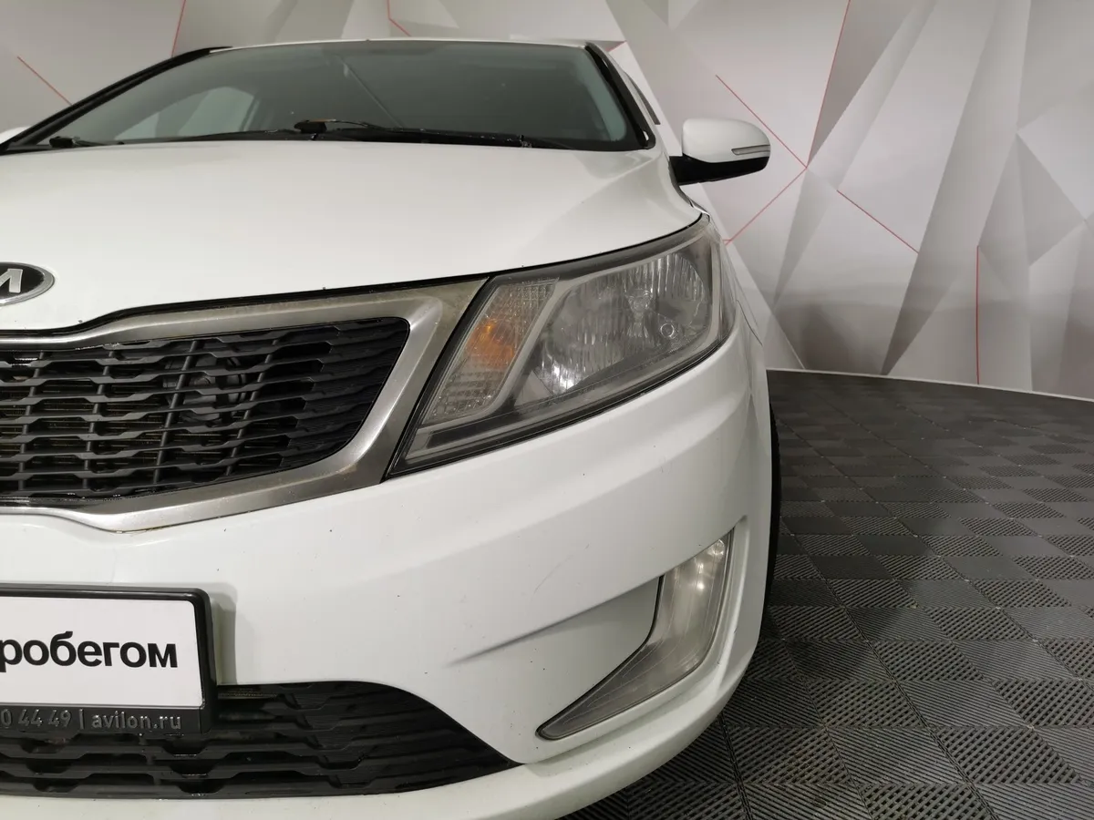 Kia Rio 1.6 AT (123 л.с.) Белый в АВИЛОН. Слайд №10