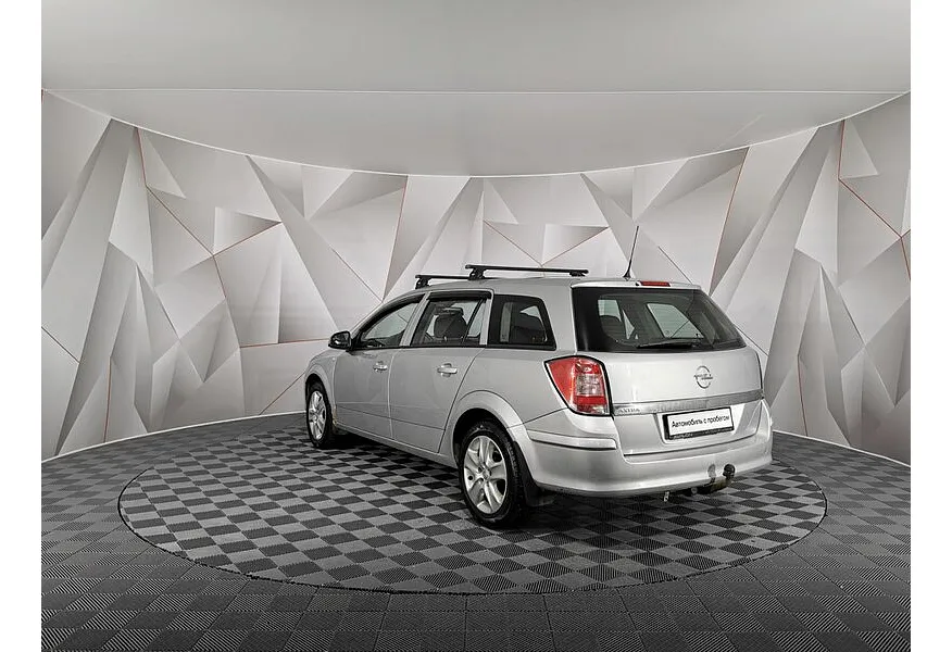 Opel Astra 1.6 MT (115 л.с.) Серебристый в АВИЛОН. Слайд №4