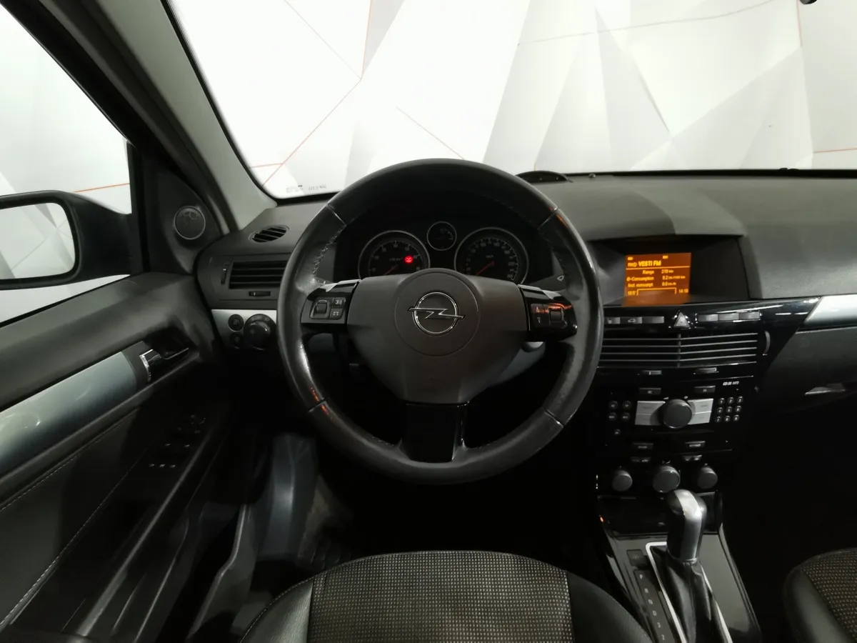 Opel Astra 1.8 AT (140 л.с.) base Черный в АВИЛОН. Слайд №19