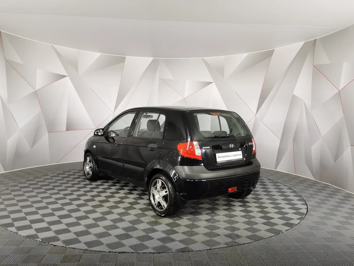 Hyundai Getz 1.4 AT (97 л.с.) Черный в АВИЛОН. Слайд №4