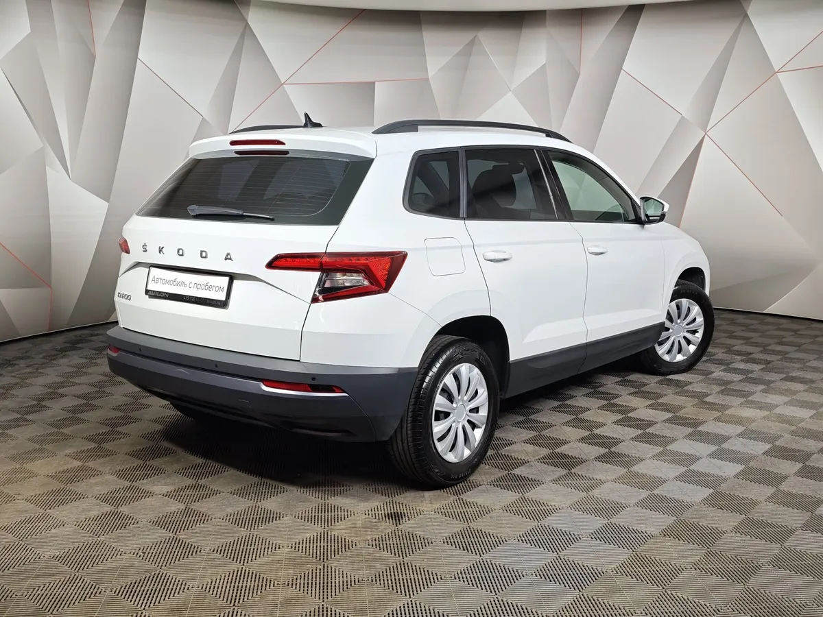 Skoda Karoq 1.4 AT FWD (150 л.с.) Ambition Белый в АВИЛОН. Слайд №2