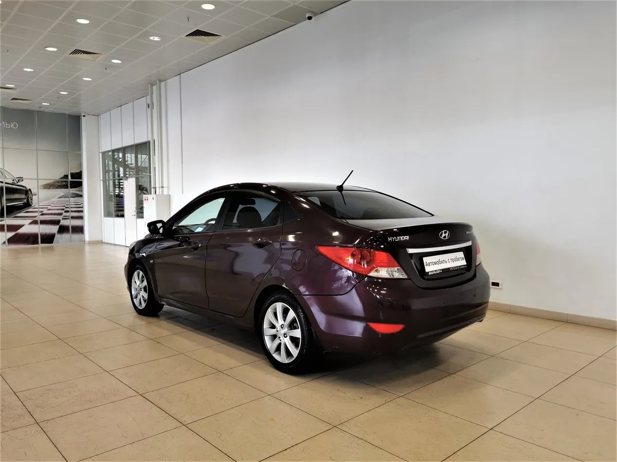 Hyundai Solaris 1.6 AT (123 л.с.) Elegance + Prestige + Safety Фиолетовый в АВИЛОН. Слайд №4
