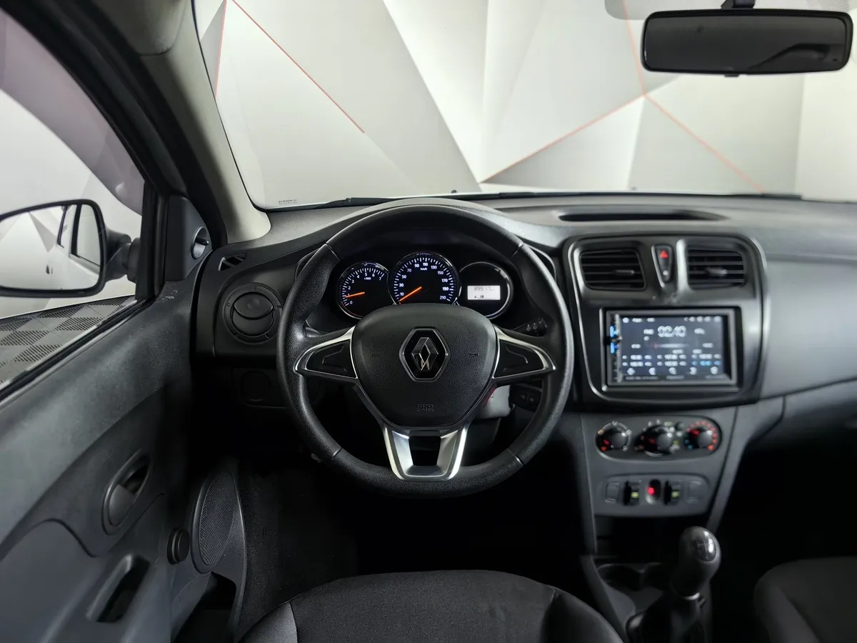 Renault Sandero 1.6 MT (82 л.с.) Confort Белый в АВИЛОН. Слайд №19