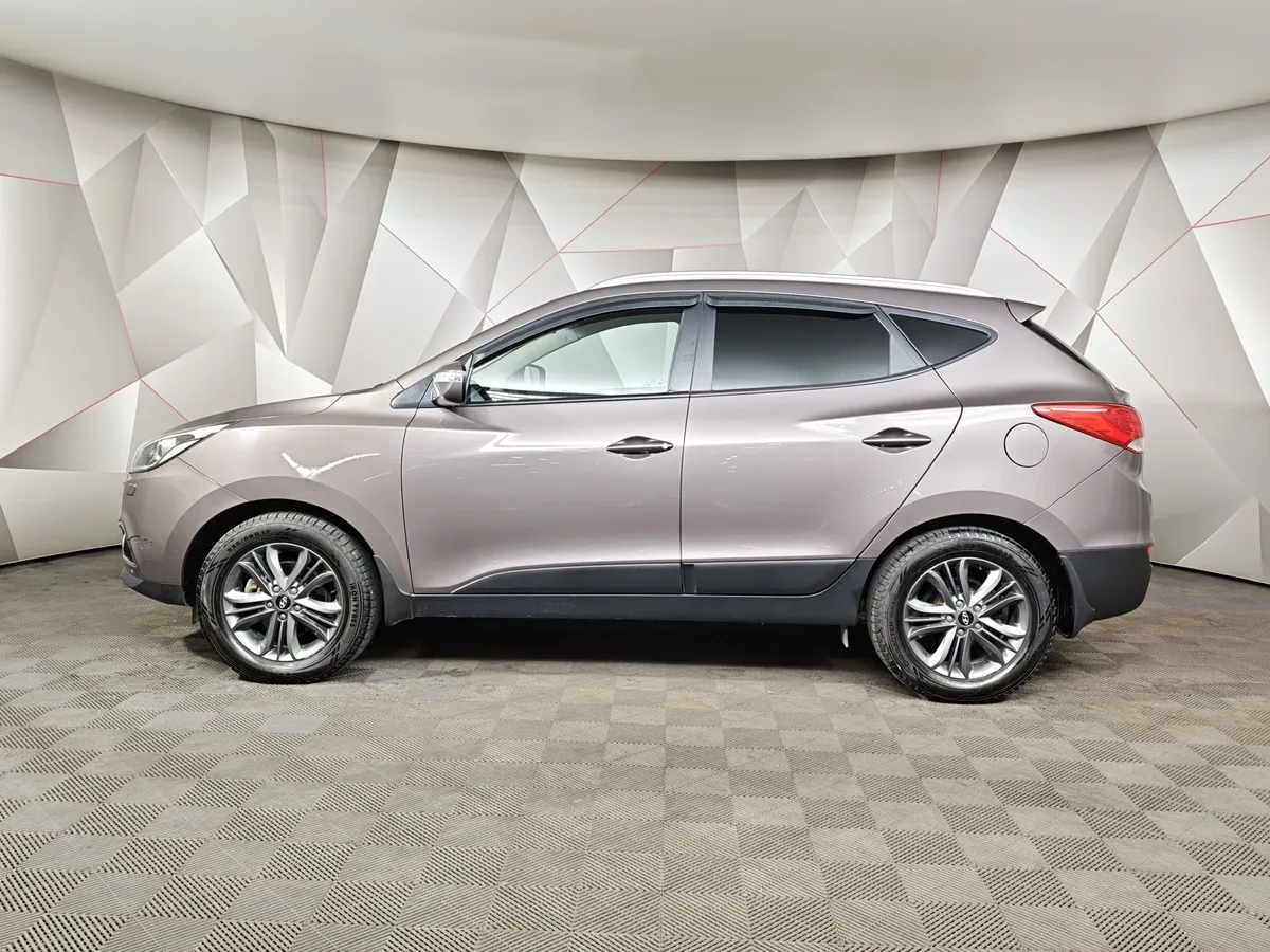 Hyundai ix35 2.0 AT 4WD (150 л.с.) Travel Коричневый в АВИЛОН. Слайд №5