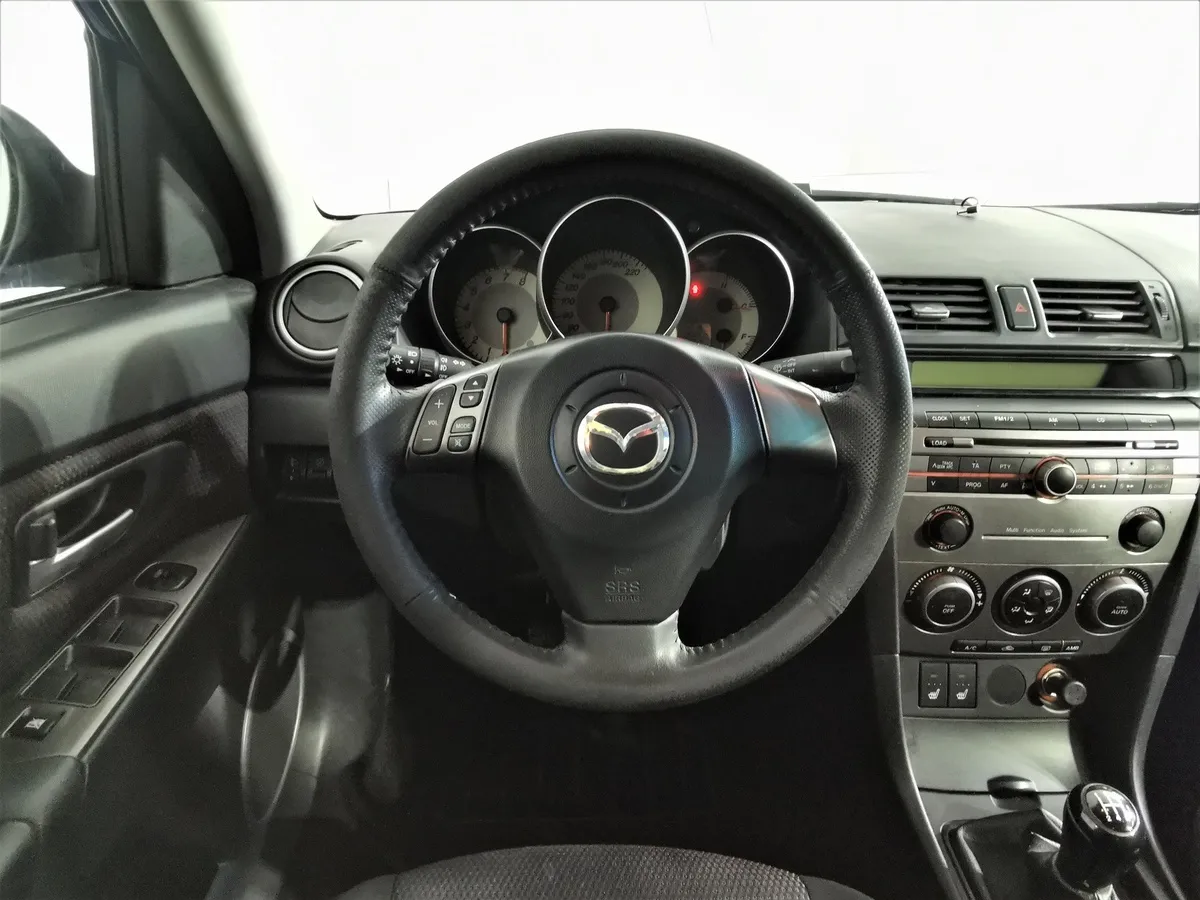Mazda 3 1.6 MT (105 л.с.) Синий в АВИЛОН. Слайд №19