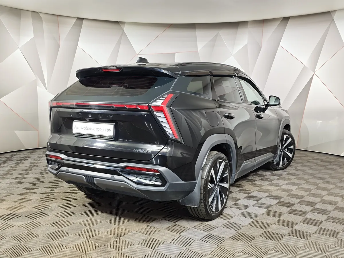 Geely Atlas 2.0T 7DCT 2WD (200 л.с.) Flagship Черный в АВИЛОН. Слайд №2