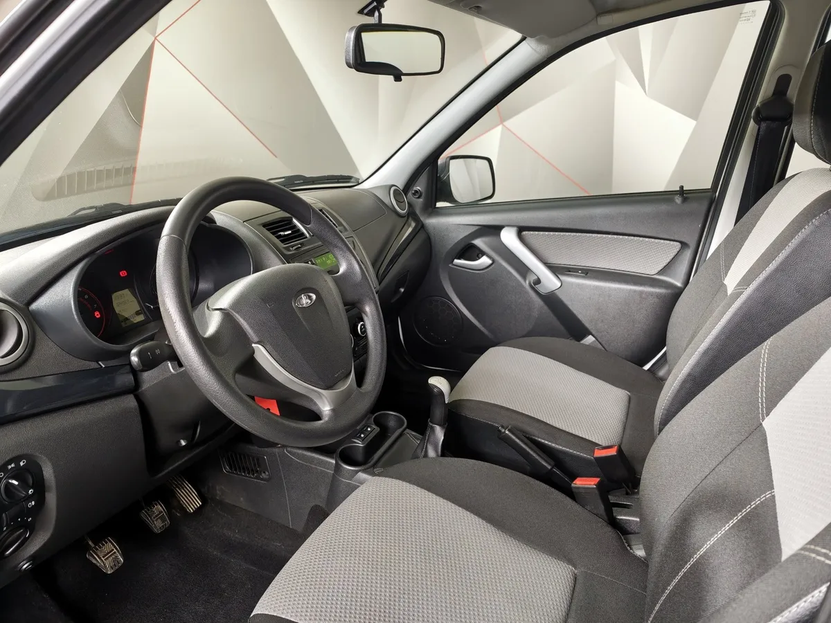 ВАЗ (Lada) Kalina 1.6 MT (87 л.с.) Белый в АВИЛОН. Слайд №16
