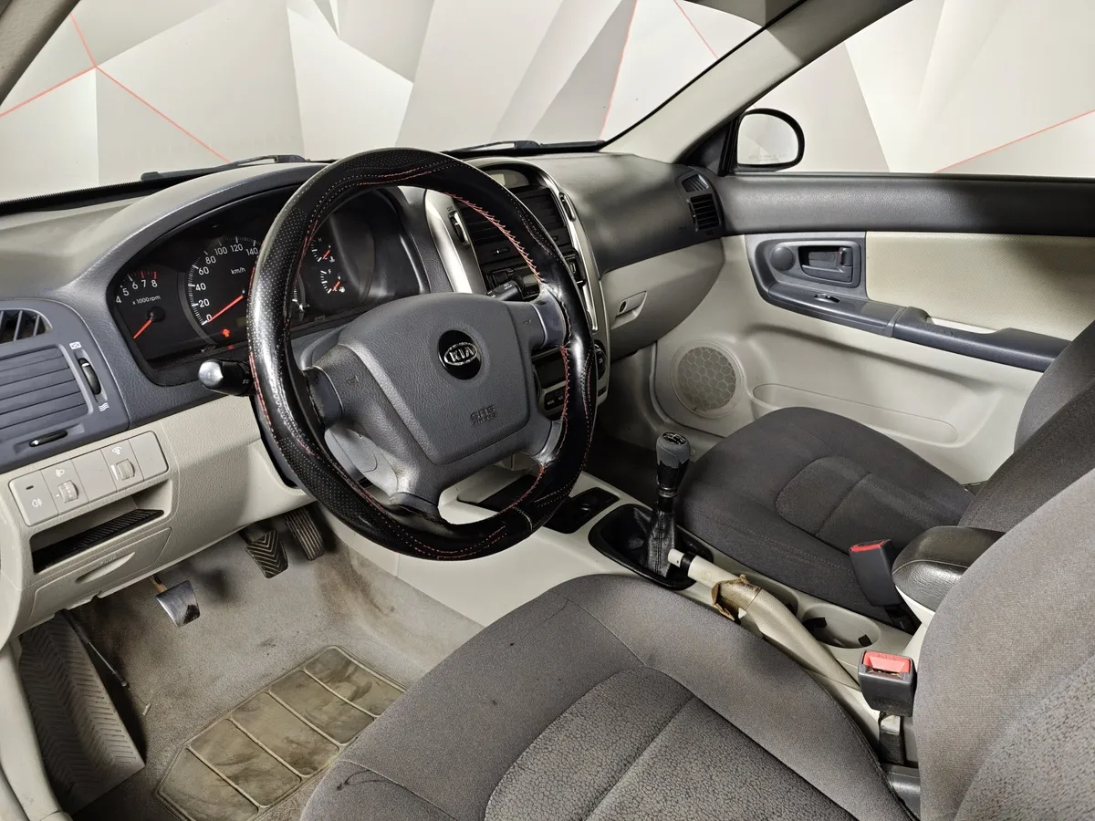 Kia Cerato 1.6 MT (105 л.с.) Черный в АВИЛОН. Слайд №16