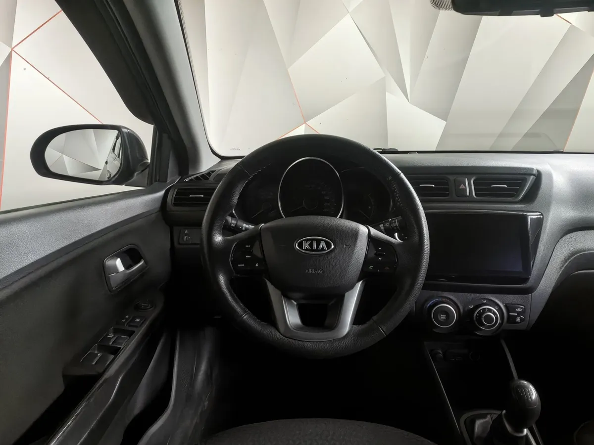 Kia Rio 1.4 MT (107 л.с.) Comfort Черный в АВИЛОН. Слайд №18