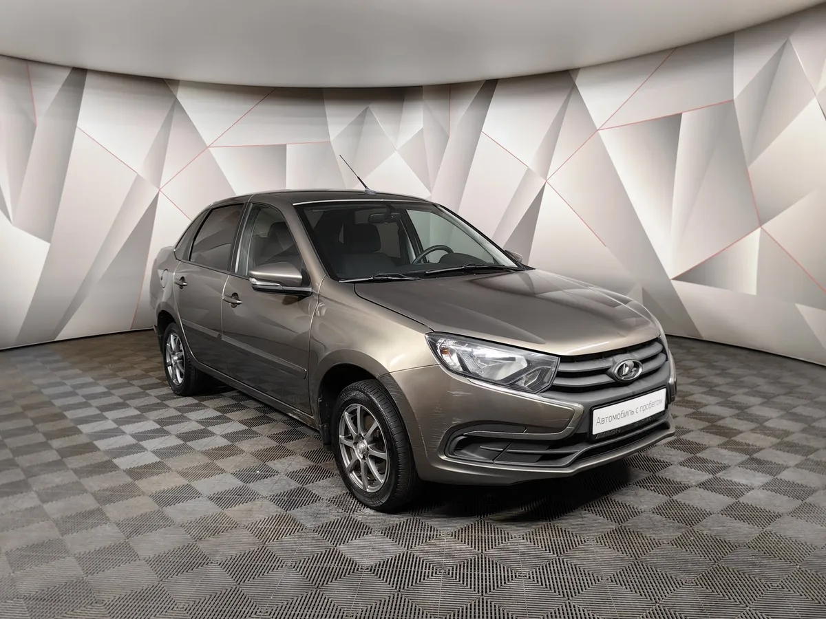 ВАЗ (Lada) Granta 1.6 MT 16 кл (106 л.с.) Коричневый в АВИЛОН. Слайд №3
