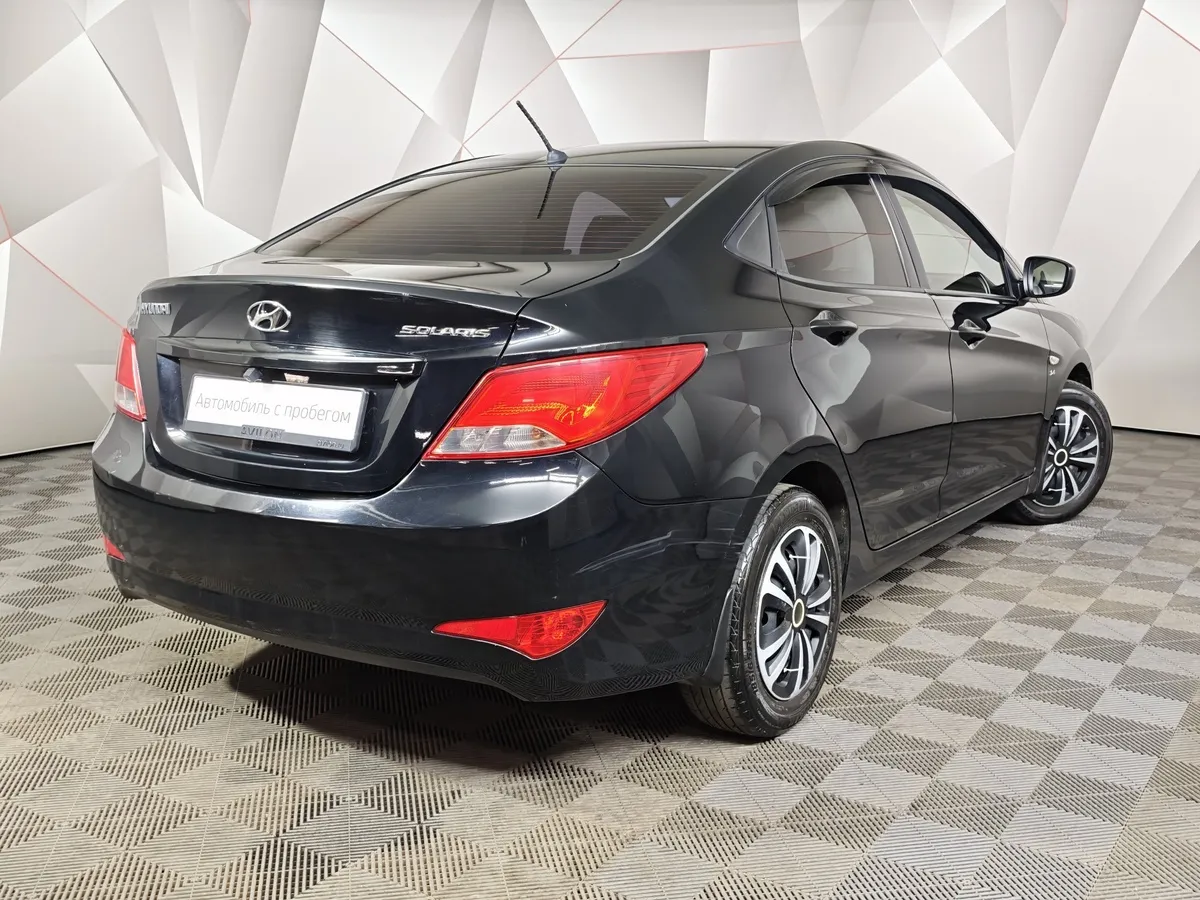 Hyundai Solaris 1.6 MT (123 л.с.) Comfort Черный в АВИЛОН. Слайд №2