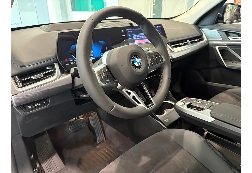 BMW X1 xDrive25 Li (204 л.с.) Синий в АВИЛОН. Слайд №7