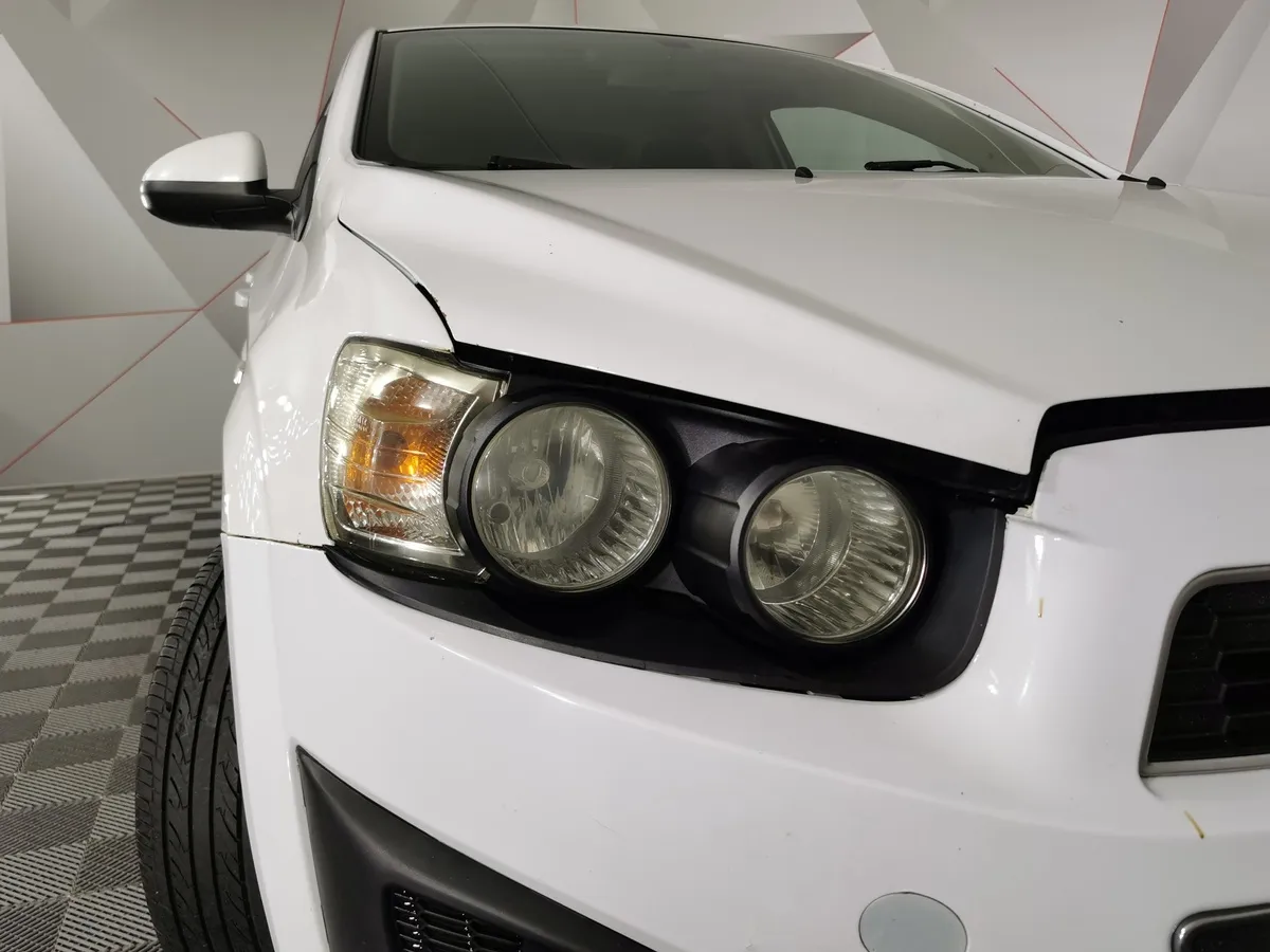 Chevrolet Aveo 1.6 AT (115 л.с.) Белый в АВИЛОН. Слайд №10