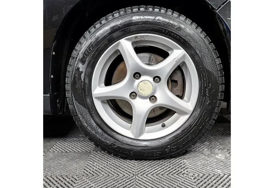 Nissan Tiida 1.6 AT (110 л.с.) Черный в АВИЛОН. Слайд №9