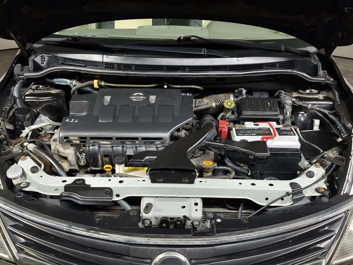 Nissan Tiida 1.6 AT (110 л.с.) Черный в АВИЛОН. Слайд №10