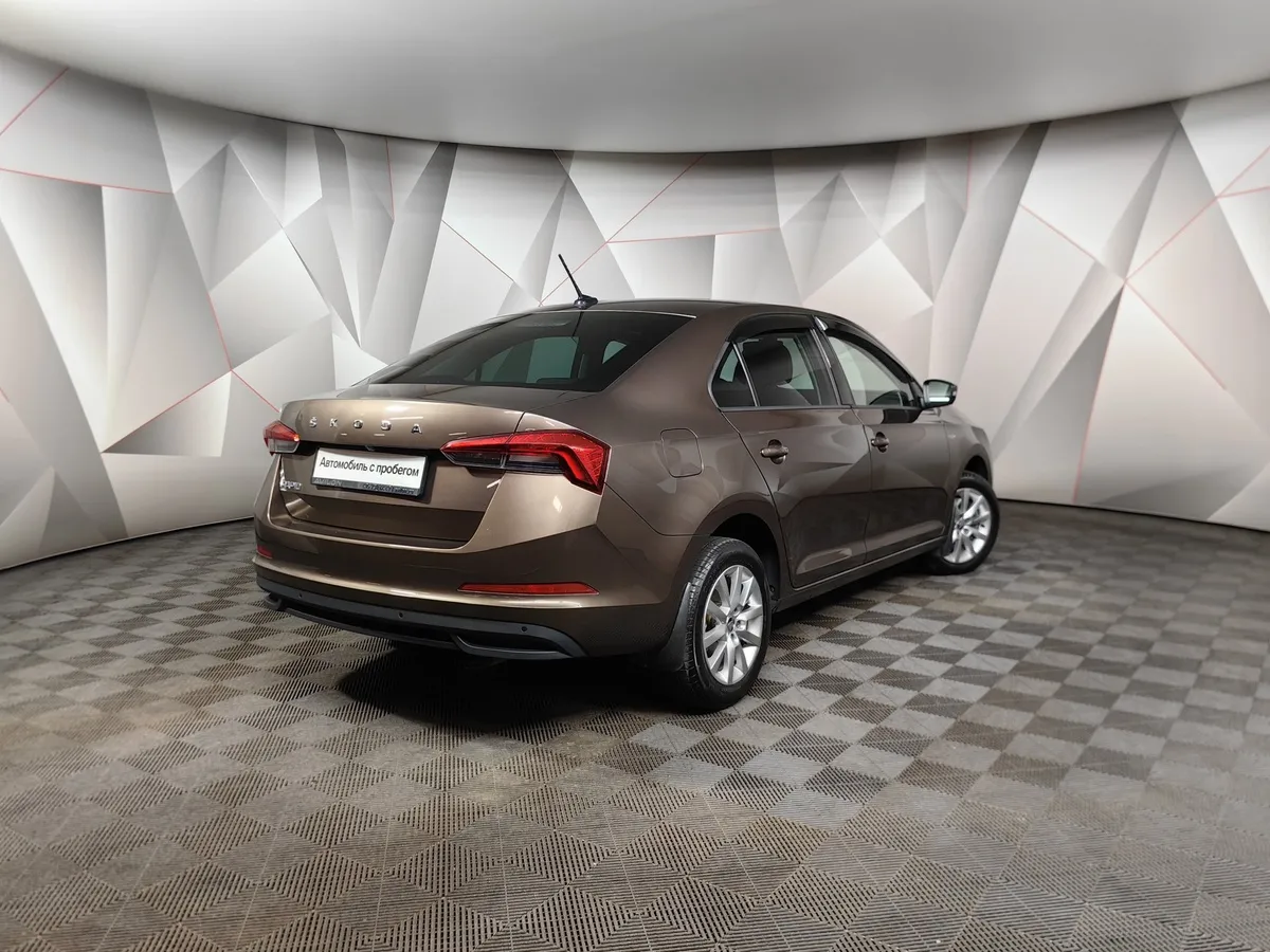 Skoda Rapid 1.6 AT (110 л.с.) Белый в АВИЛОН. Слайд №2