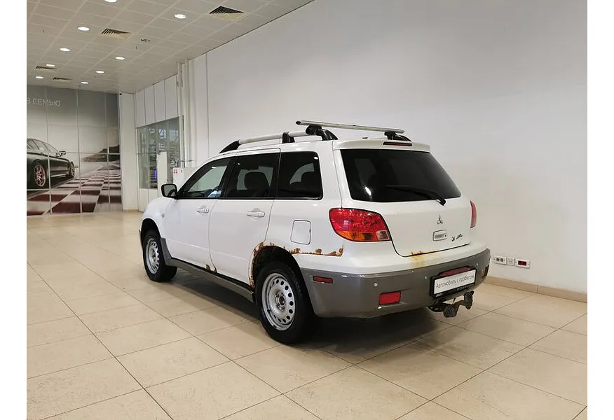 Mitsubishi Outlander 2.4 AT 4WD (160 л.с.) Белый в АВИЛОН. Слайд №4