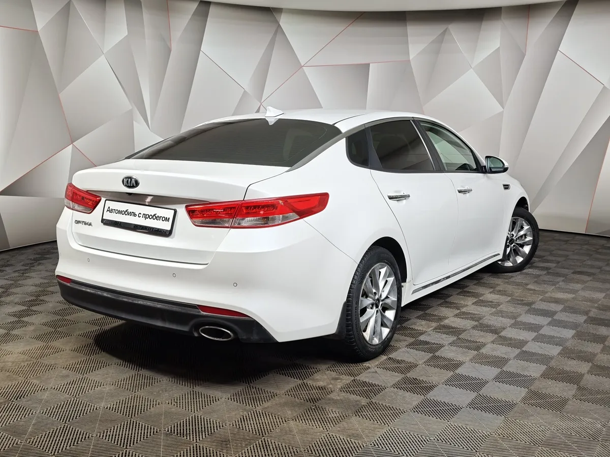 Kia Optima 2.0 AT (150 л.с.) Белый в АВИЛОН. Слайд №2