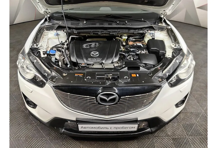 Mazda CX-5 2.0 SKYACTIV AT (150 л.с.) Drive Белый в АВИЛОН. Слайд №11 Mazda CX-5 2.0 SKYACTIV AT (150 л.с.) Drive Белый в АВИЛОН. Слайд №11