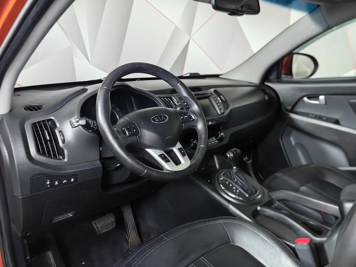 Kia Sportage 2.0 AT AWD (150 л.с.) Оранжевый в АВИЛОН. Слайд №18