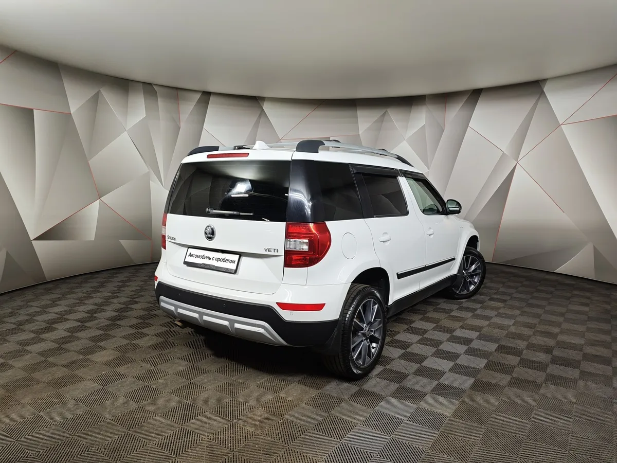 Skoda Yeti 1.6 AT (110 л.с.) Белый в АВИЛОН. Слайд №2