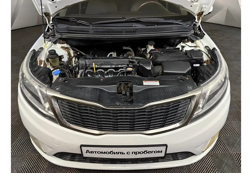 Kia Rio 1.4 MT (107 л.с.) Белый в АВИЛОН. Слайд №10