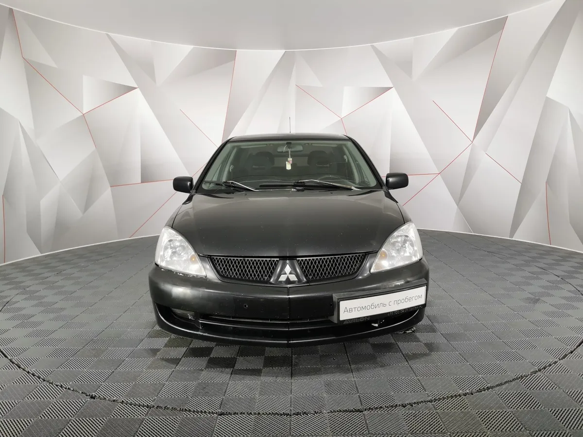 Mitsubishi Lancer 1.3 MT (82 л.с.) Черный в АВИЛОН. Слайд №7