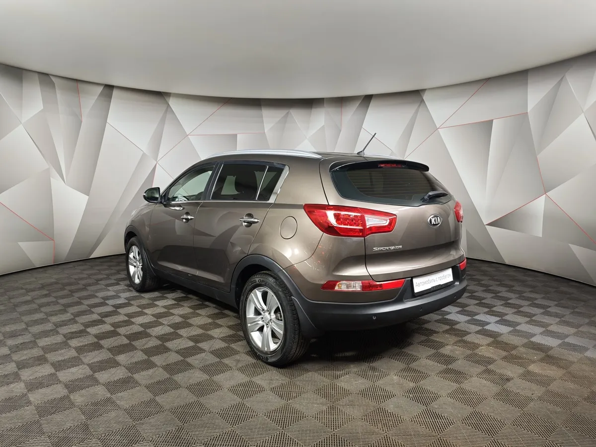 Kia Sportage 2.0 AT (150 л.с.) Коричневый в АВИЛОН. Слайд №4