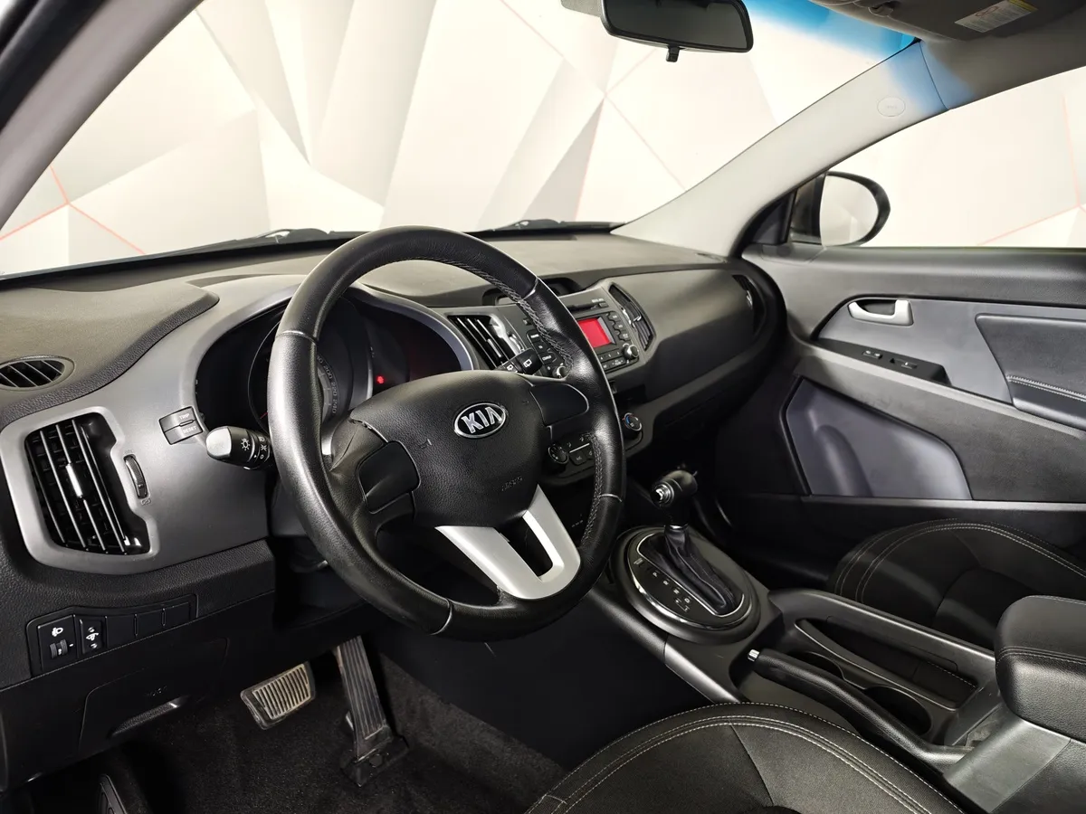 Kia Sportage 2.0 AT (150 л.с.) Коричневый в АВИЛОН. Слайд №19