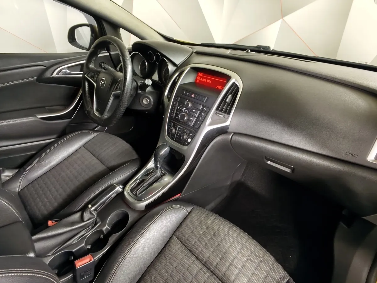Opel Astra 1.4 Turbo AT (140 л.с.) Enjoy Желтый в АВИЛОН. Слайд №13