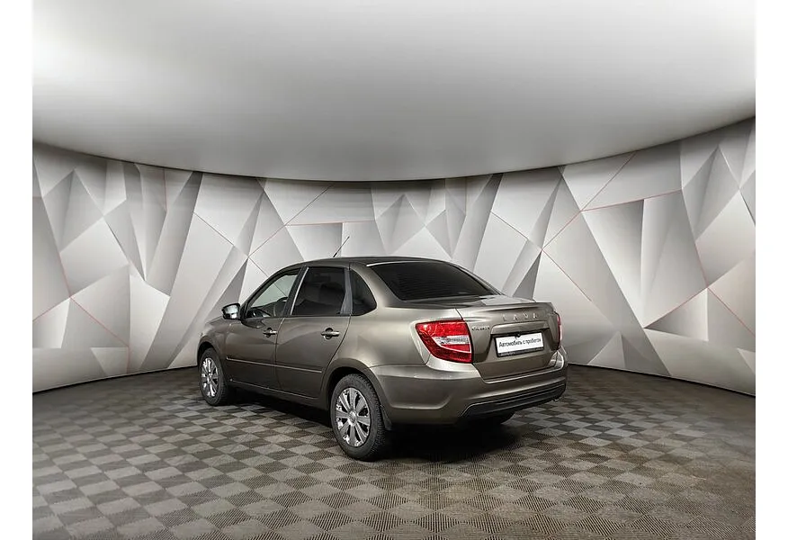 ВАЗ (Lada) Granta 1.6 MT 16 кл (106 л.с.) Коричневый в АВИЛОН. Слайд №4