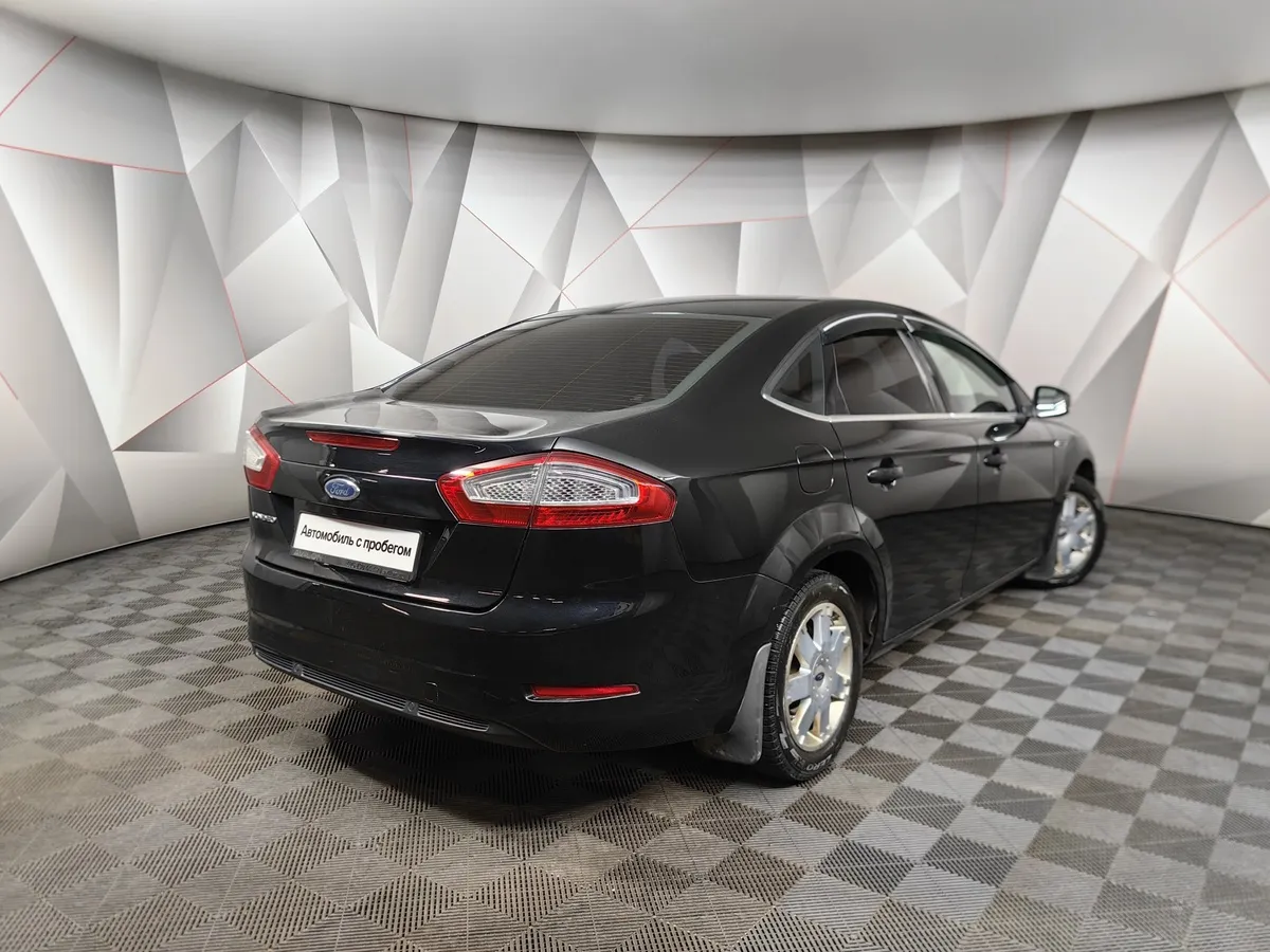 Ford Mondeo 2.0 MT (145 л.с.) Черный в АВИЛОН. Слайд №2