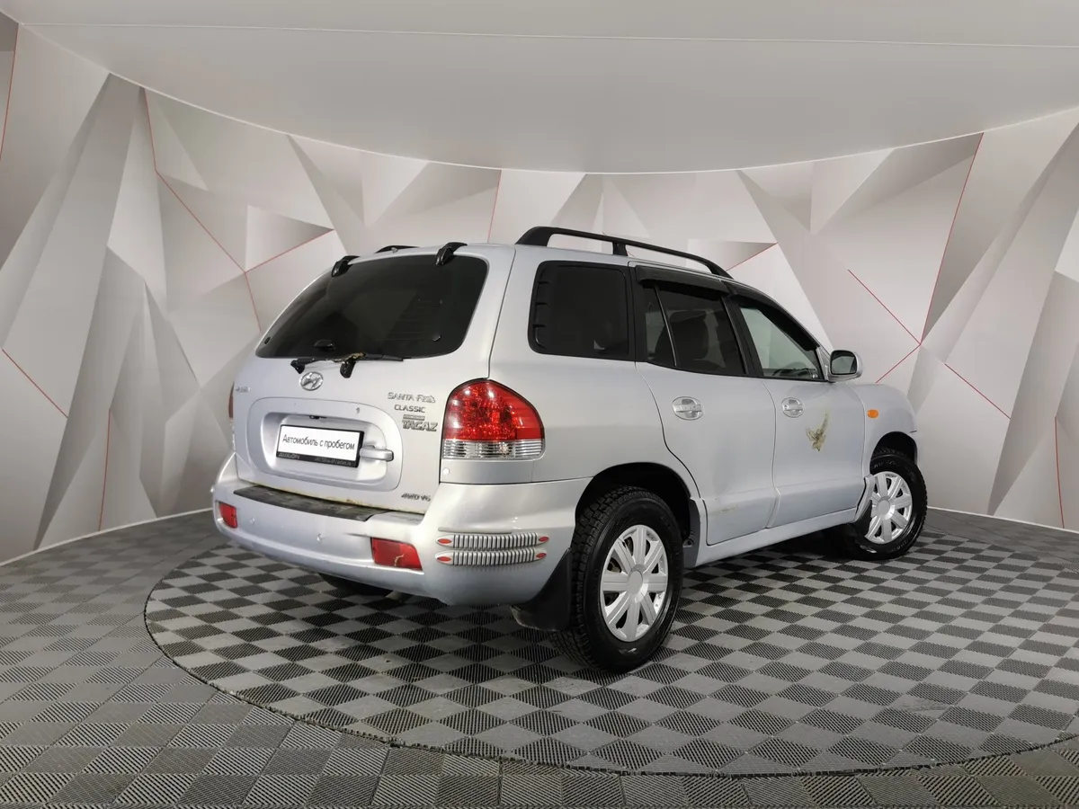 Hyundai Santa Fe 2.7 AT (173 л.с.) Серебристый в АВИЛОН. Слайд №2