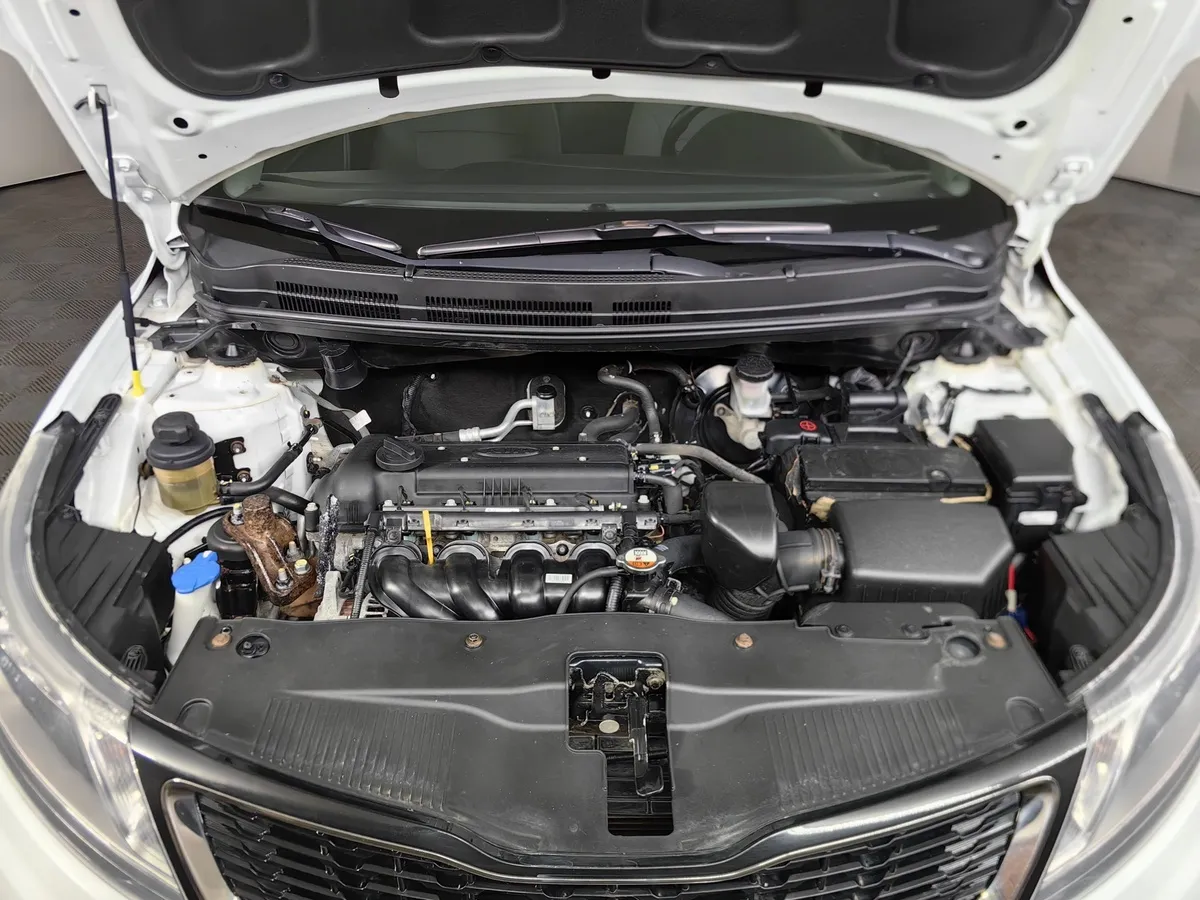 Kia Rio 1.6 MT (123 л.с.) Белый в АВИЛОН. Слайд №11