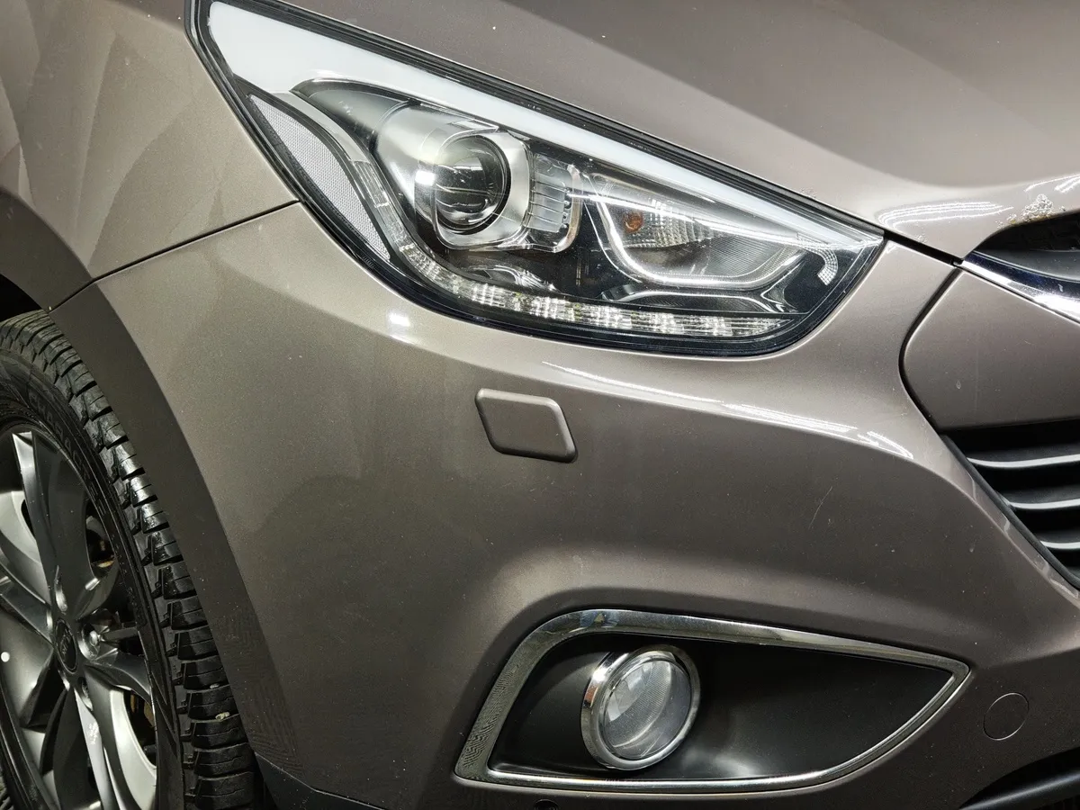 Hyundai ix35 2.0 AT 4WD (150 л.с.) Travel Коричневый в АВИЛОН. Слайд №10
